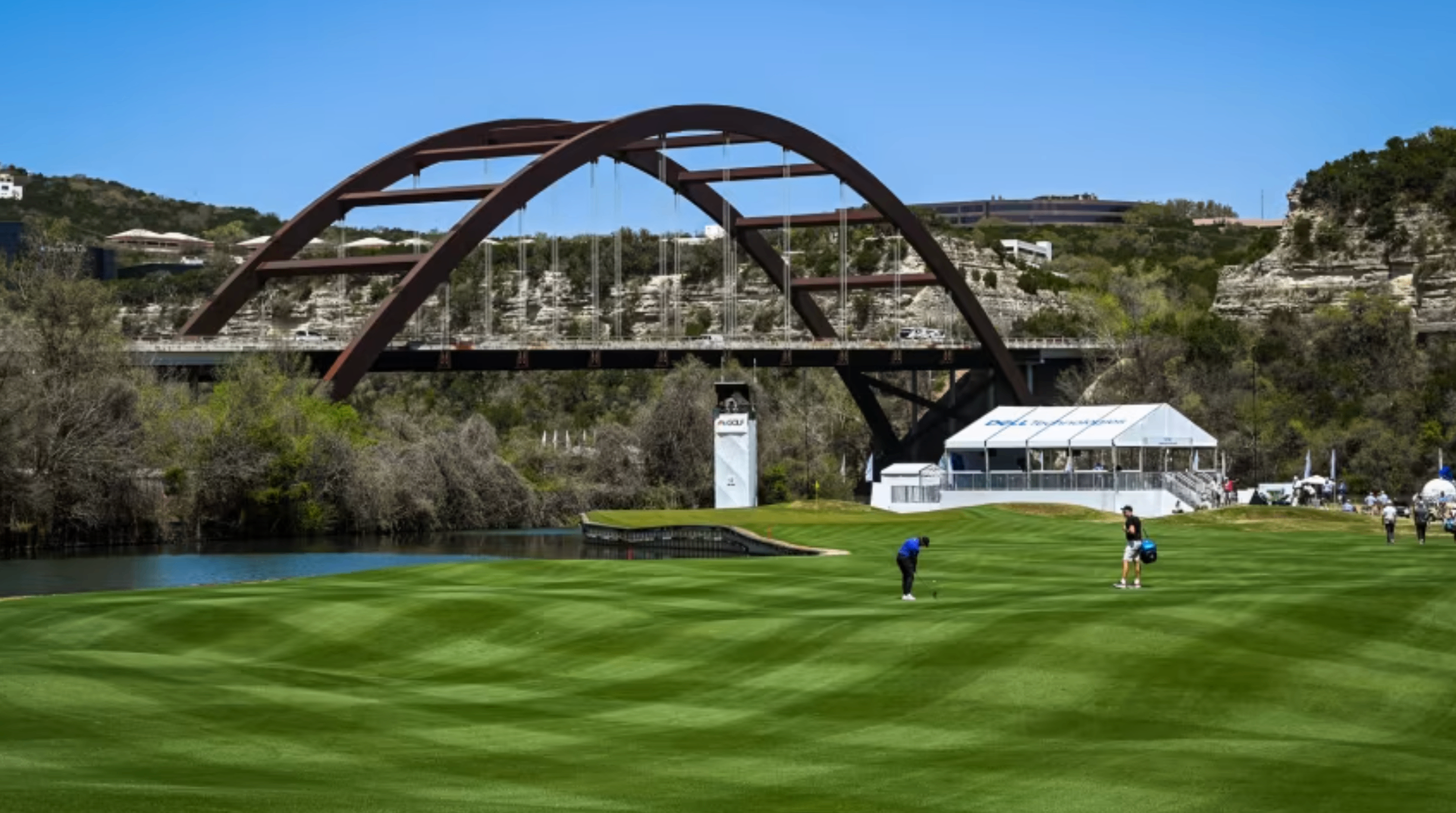 Austin Country Club — approach shot on the par-4 13th with the Pennybacker 360 Bridge over Lake Austin, host of the WGC Dell Match Play